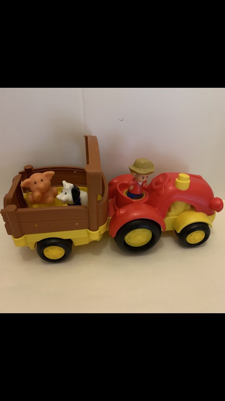 Little People Tractor with Farmer, Cow, Pig, and Hay Bale, $13