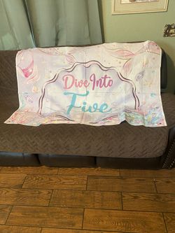 Little Mermaid diving into five banner