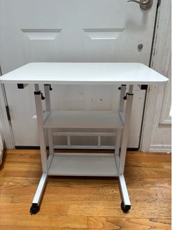Adjustable height kids desk/ side table