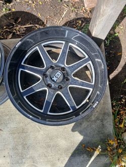 3 KMC XD844 Pike wheels in a black gloss
