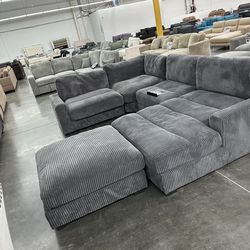 Modular Sectional 7 Pc  New Sectional  Color Gray Wide-welt Corduroy  Sofa Armless Chaise  and ottoman Sectional xl   127” x 164”   Bonito sectional d