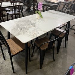 Brand new 7 pcs of set, Sintered Stone Dining Table: 63 Inch Grey Kitchen Table with Metal Legs ,with 6 chairs  $350  Warehouse Address: 2745 Boone st