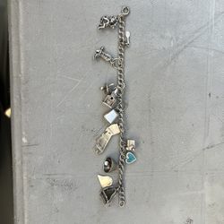 Silver Bracelet With 11 Silver Charms