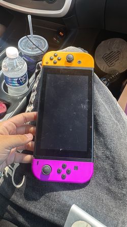 Nintendo Switch with Orange and Purple Joy-Cons