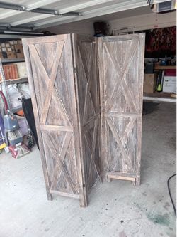 3 panel wooden room divider.