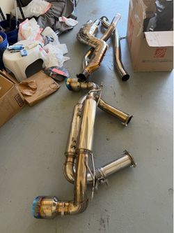 Invidia Cat-Back Exhaust with Burnt Titanium Tips for A90 GR Supra