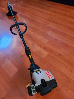 ~GAS STRAIGHT SHAFT WEED TRIMMER IN GREAT WORKING CONDITION TURNS ON FAST AND EASY~
