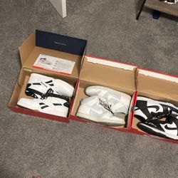 two pairs of dunk highs and reebok 