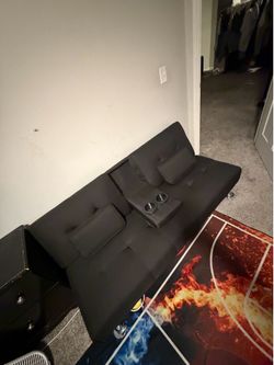 Futon couch with cupholders
