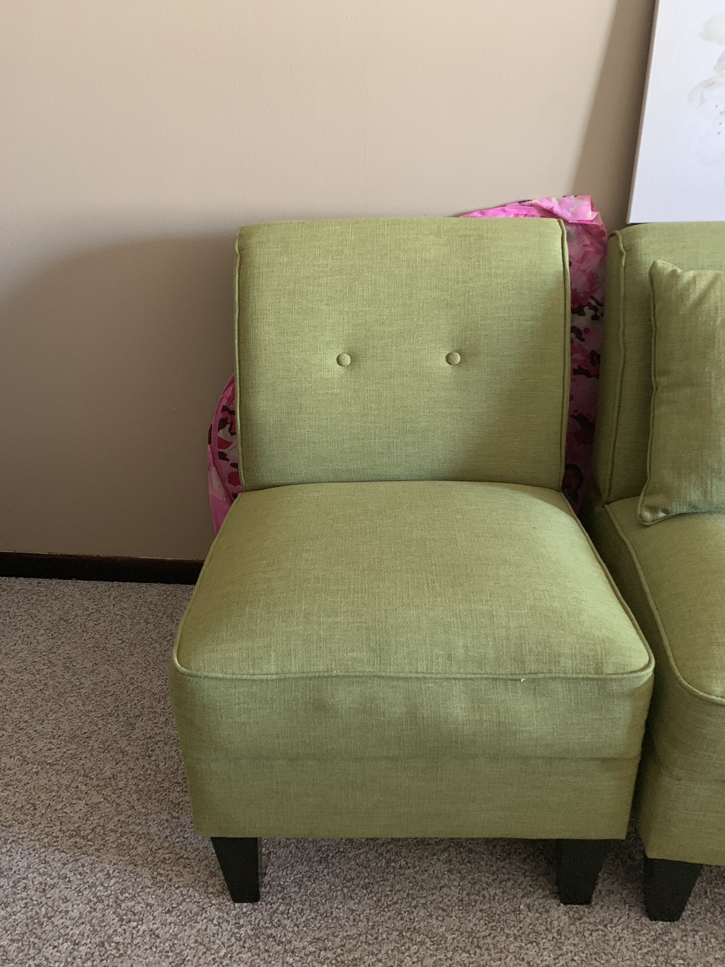 Tropical green sofa with matching chair and throw pillows