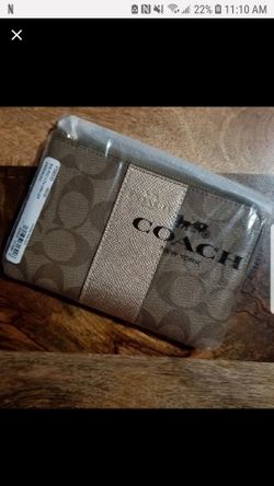 Coach rosegold wristlet
