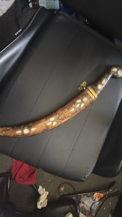 Decorative Curved Dagger with Ornate Scabbard