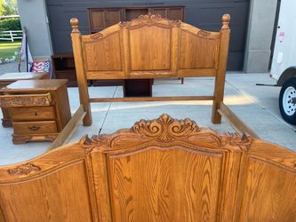 Solid oak carved King bedroom set.