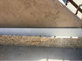 Granite backsplash white one is quartz $20 each backsplash pieces