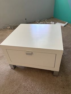 Small storage table with drawer