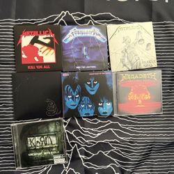 Metallica, Kiss, Megadeth, & Korn CDs