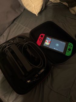 Nintendo Switch with Red and Green Joy-Cons