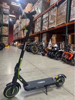 Electric scooter with shock absorption