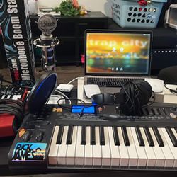 Music Producing Studio With MacBook Pro And Accesories
