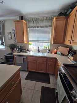Complete Kitchen Cabinets with Corian Countertops