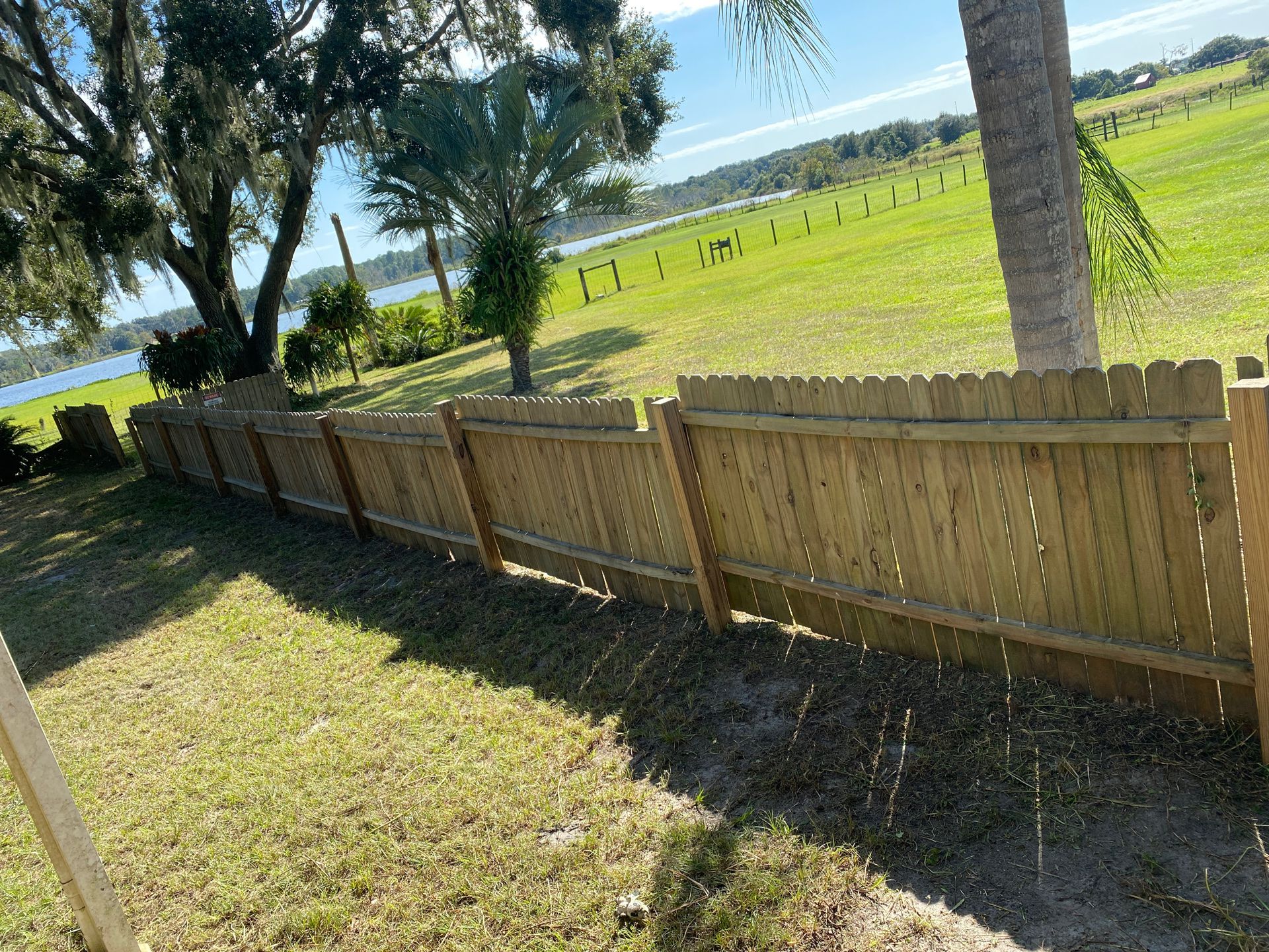 2 year old picket fence with posts 4ft by 8ft panels 136ft