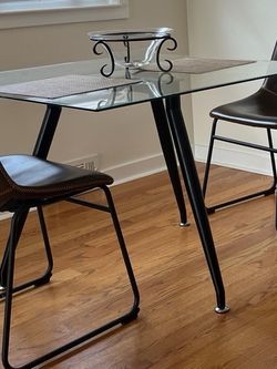 Glass Top Dining Table with Black Legs