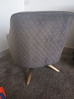 Grey swivel chair