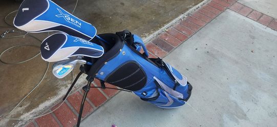 Kids golf clubs and bag. Right  handed.