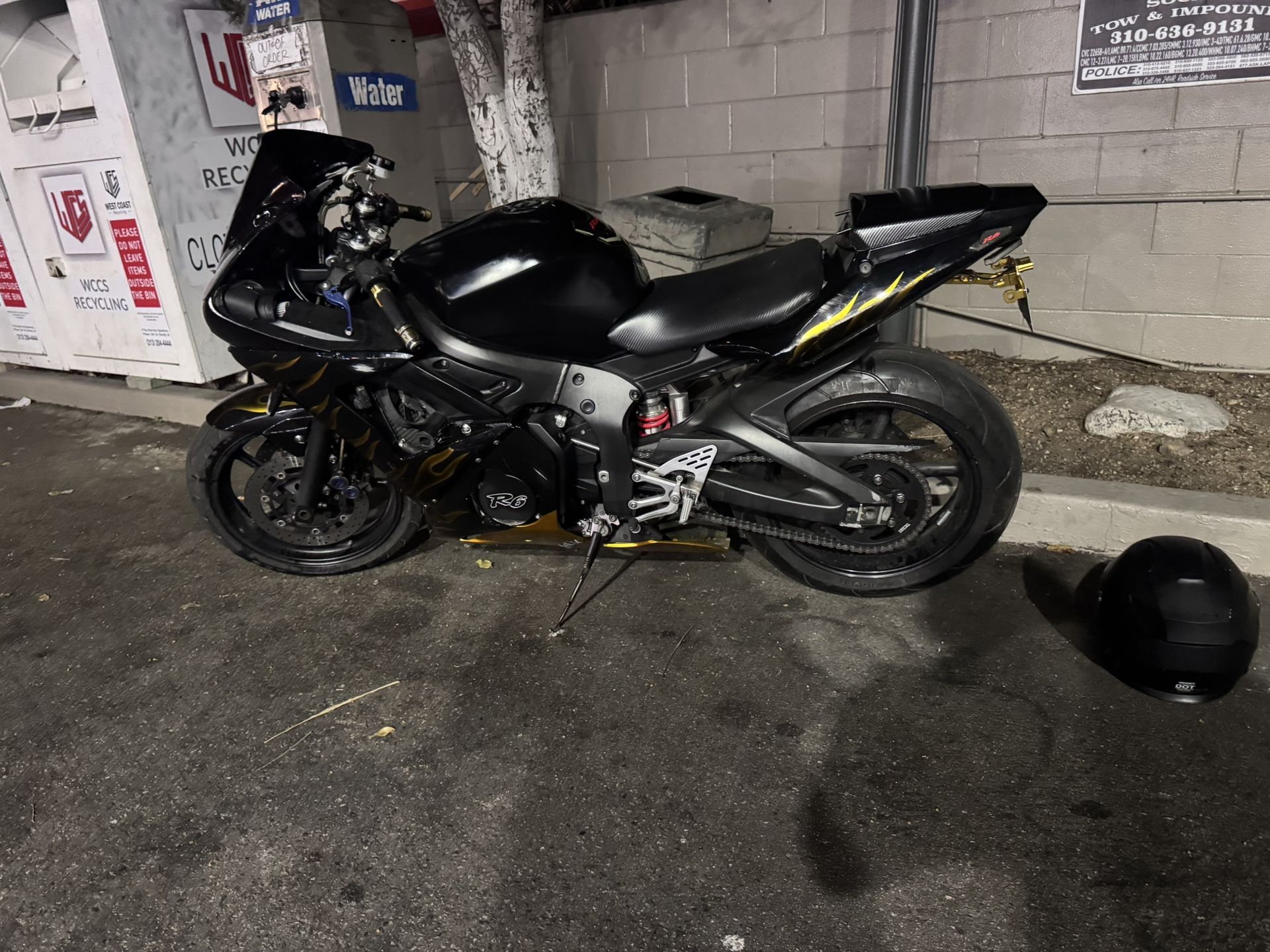 R6 Bike Bike holds a clean title has an aftermarket exhaust very clean low miles would suggest new fairings willing to negotiate or trade for same val