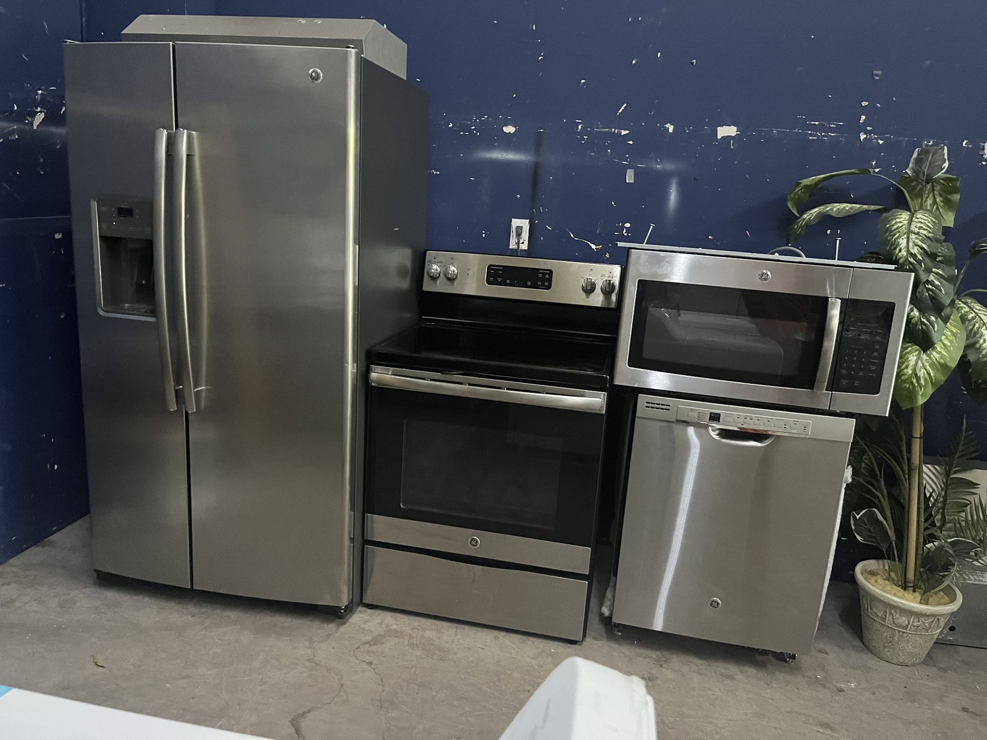 Side By Side Stainless Steel Kitchen Appliance Package.