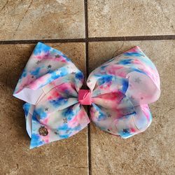 New. New without tags. JoJo Siwa Silver Stars Bow