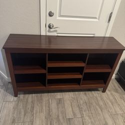 media console with shelving