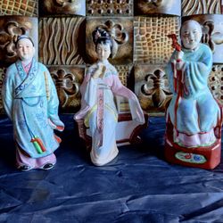 THREE VINTAGE PORCELAIN ASIAN STATUES