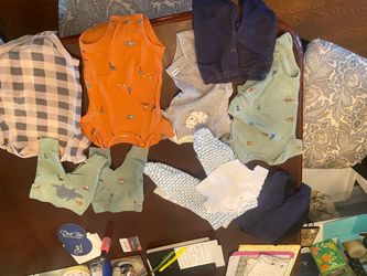 Lots of gently loved baby clothes