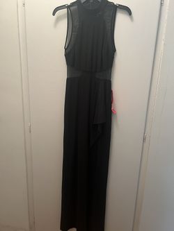 Brand new with tag Size 3 black maxi dress with mesh see through sections!