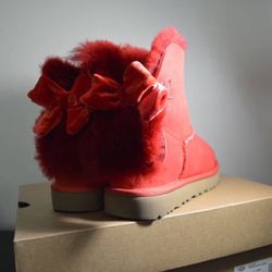 Red UGG Bailey Button Boots with bows