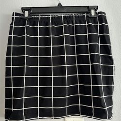 Black and White vertical and horizontal lined skirt with two small front slits