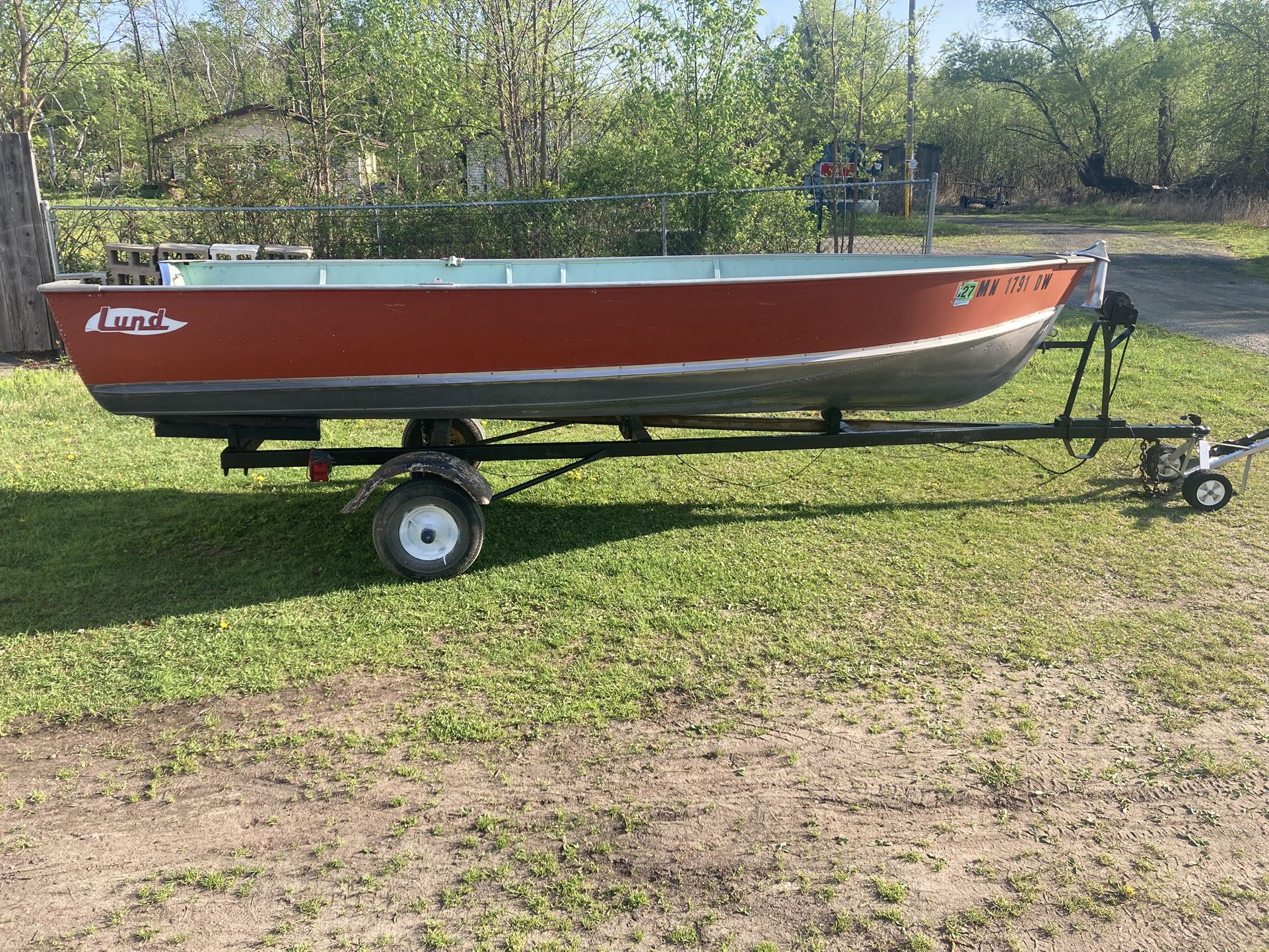 Mint Condition Lund Fishing Boat and Trailer