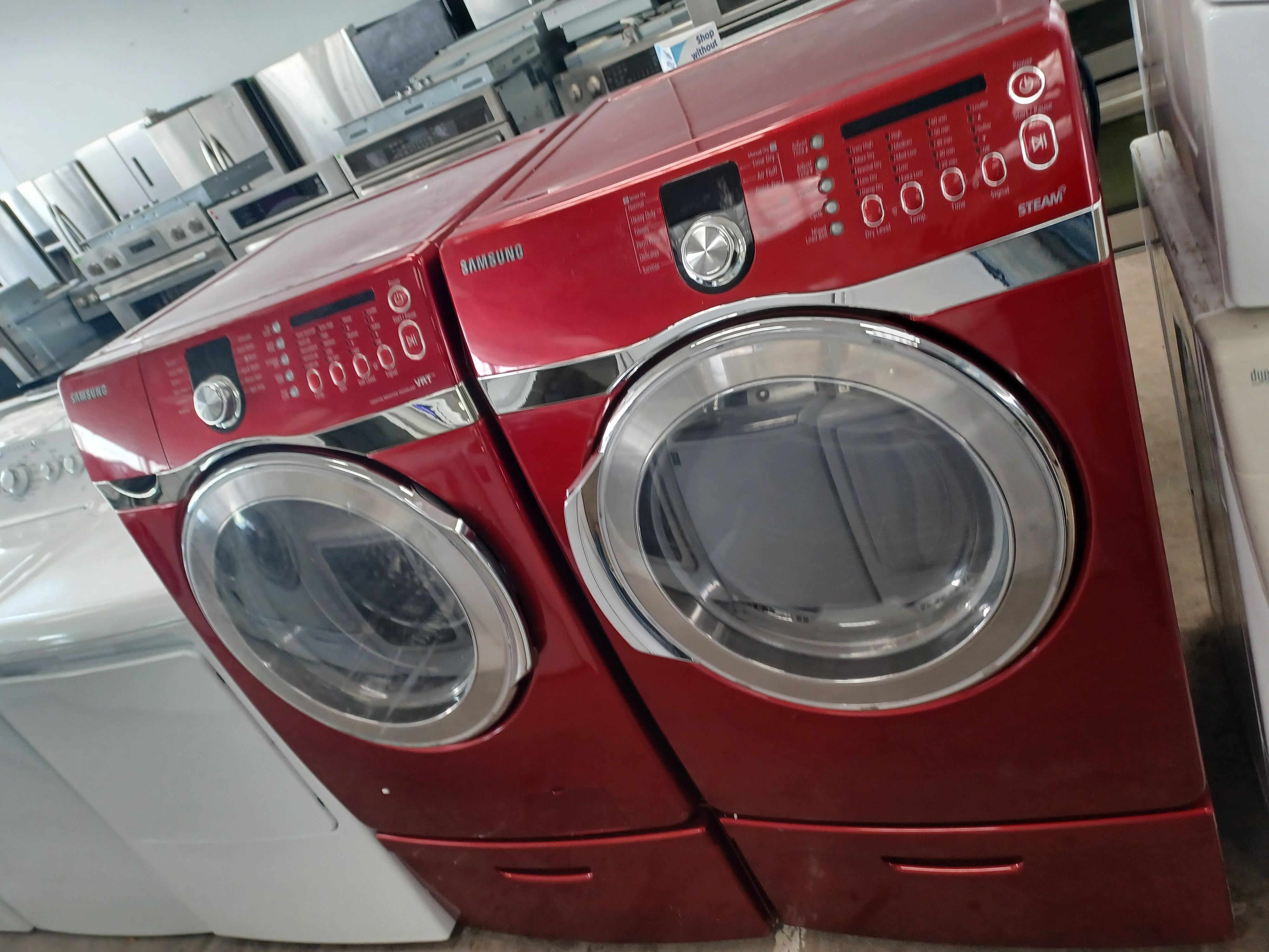 Samsung red front load washer and dryer set on pedestals - Free delivery