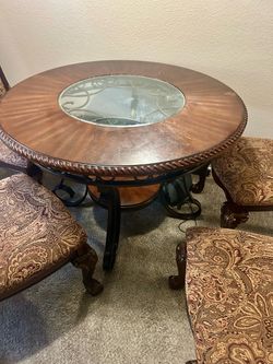 Dinner table with four chairs
