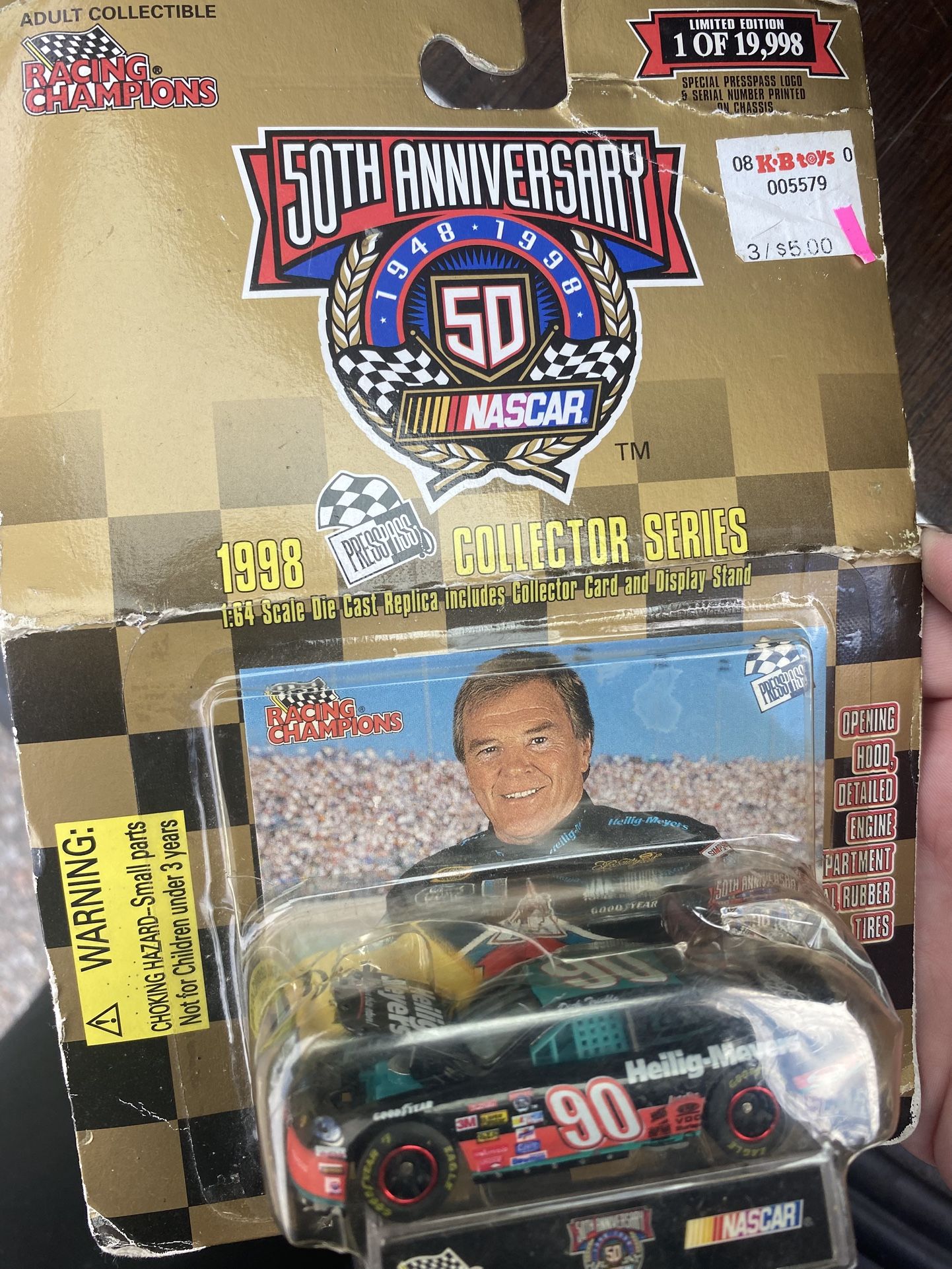 1998 Racing Champions 50th Anniversary Collector Series 1:64 scale die-cast replica of the #90 Heilig-Meyers Ford Taurus driven by Dick Trickle.