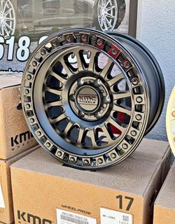 KMC IMS 17” 17x8.5 6x135 -10 Wheels in stock 265/70R17 A/T Tires Fits Ford F-150 WE FINANCE