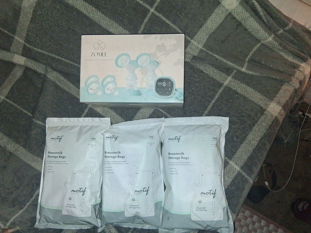 Zomee Z2 Double Electric Breast Pump and 3 packages of motif storage bags seals unbroken.  never opened.