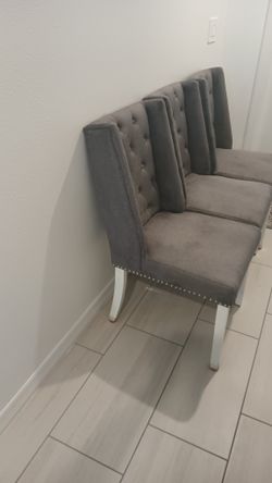 Gray upholstered dining chairs