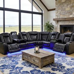 Black leathwr power electric  fully reclining setional  couch setc