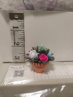 Quilling Art (delicate paper decorations)
