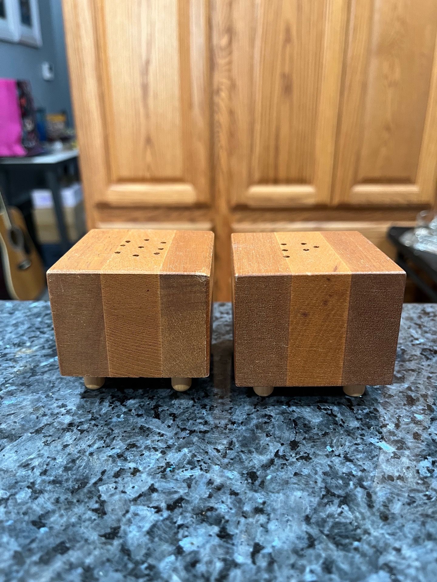 Vintage Square Wood pair of salt and pepper shakers. Preowned never used. Has been on display in a cabinet with a very large salt and pepper shakers