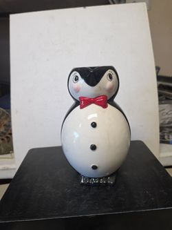 Penguin water petcher.
