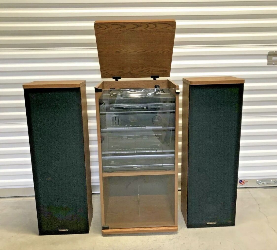 STEREO COMBO: TURNTABLE, CASSETTE PLAYER, CD DVD PLAYER, SPEAKERS & CABINET