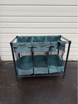 three-bag laundry sorter on a heavy-duty wire shelving frame.